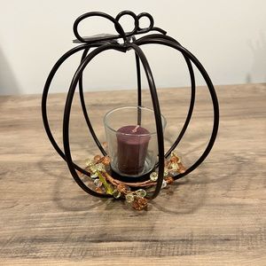 Pumpkin votive holder with votive